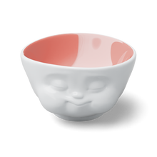 Load image into Gallery viewer, Designer 16.9 ounce capacity porcelain bowl in white with peach color on the inside featuring a sculpted ‘munching’ facial expression. From the TASSEN product family of fun dishware by FIFTYEIGHT Products. Quality bowl perfect for cereal, soup, side salads, and hearty dips.

