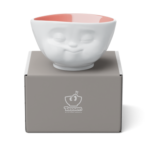 Designer 16.9 ounce capacity porcelain bowl in white with peach color on the inside featuring a sculpted ‘munching’ facial expression. From the TASSEN product family of fun dishware by FIFTYEIGHT Products. Quality bowl perfect for cereal, soup, side salads, and hearty dips.