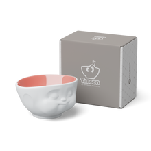 Load image into Gallery viewer, Designer 16.9 ounce capacity porcelain bowl in white with peach color on the inside featuring a sculpted ‘munching’ facial expression. From the TASSEN product family of fun dishware by FIFTYEIGHT Products. Quality bowl perfect for cereal, soup, side salads, and hearty dips.
