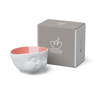 Designer 16.9 ounce capacity porcelain bowl in white with peach color on the inside featuring a sculpted ‘munching’ facial expression. From the TASSEN product family of fun dishware by FIFTYEIGHT Products. Quality bowl perfect for cereal, soup, side salads, and hearty dips.